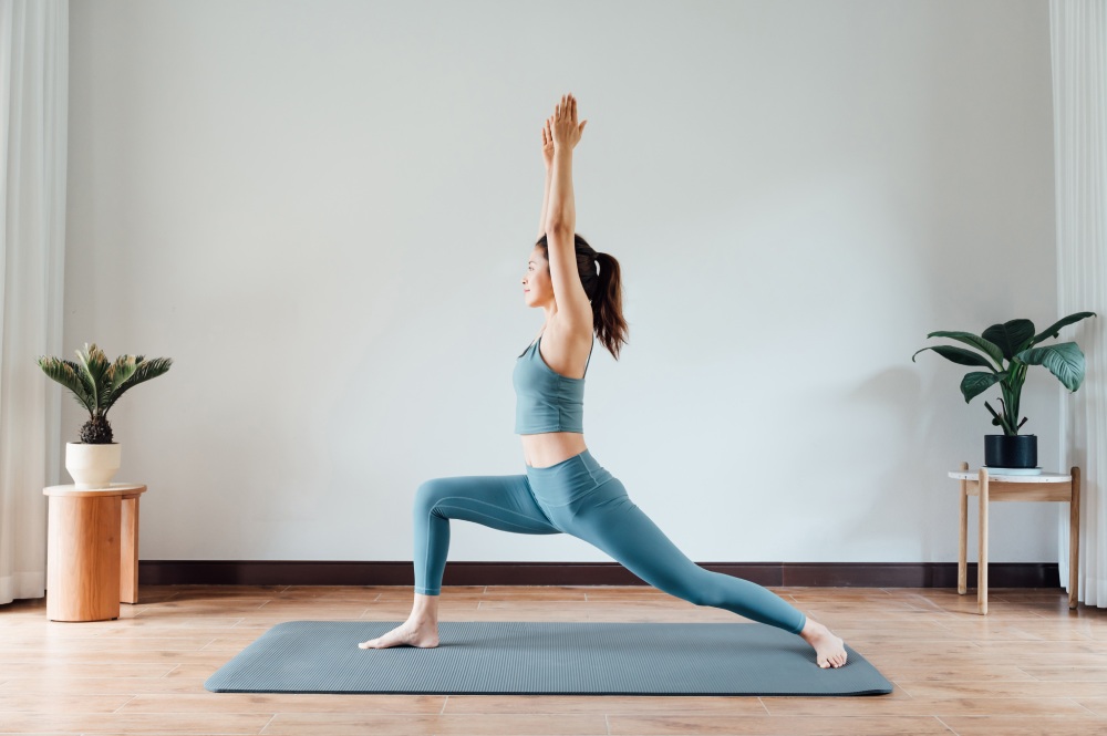 A woman in a yoga pose, exploring the benefits of drip hydration and IV therapy.